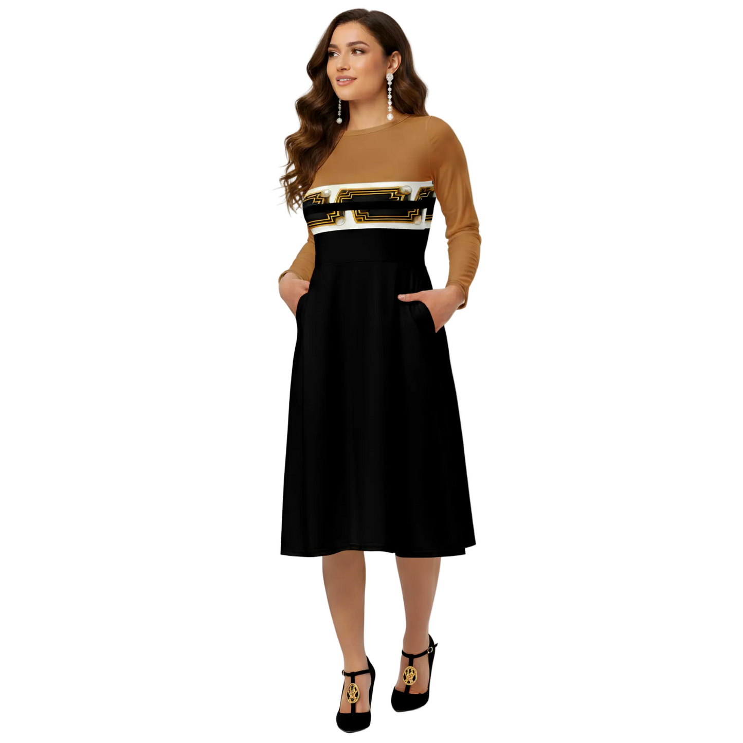 A Hispanic model wearing ARTEMI ARTELIA original designs — an A-line long sleeve jersey midi dress in nude and black colour-block design featuring Egyptian Revival Art Deco Pharaoh motifs.