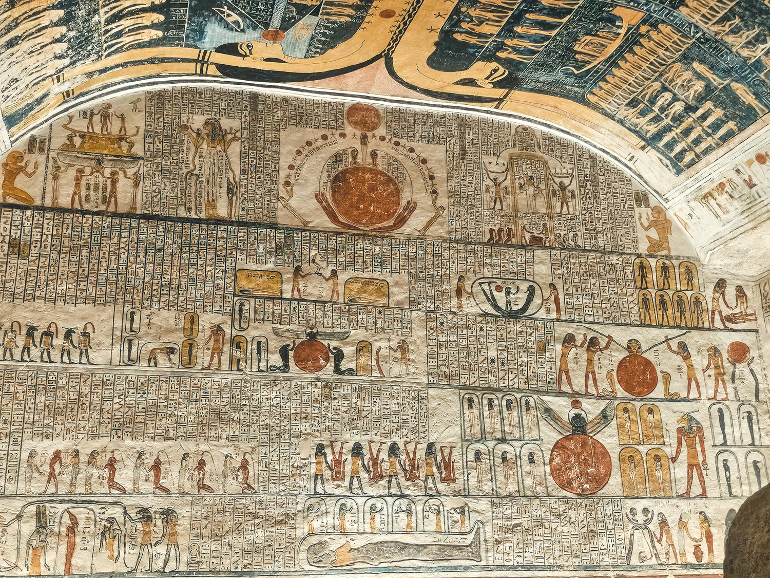 Exquisite mythical and symbolic Ancient Egyptian hieroglyphs artwork painted at Aswan Temple.