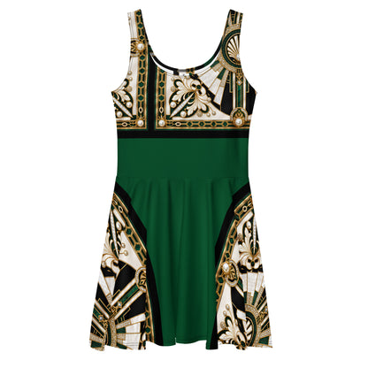 A sleeveless scoop-neck dress with a solid dark green skirt and a Art Deco inspired patterned bodice and flared hem. The pattern features cream, black, and gold Sunburst & Medallion motifs from 1920's.