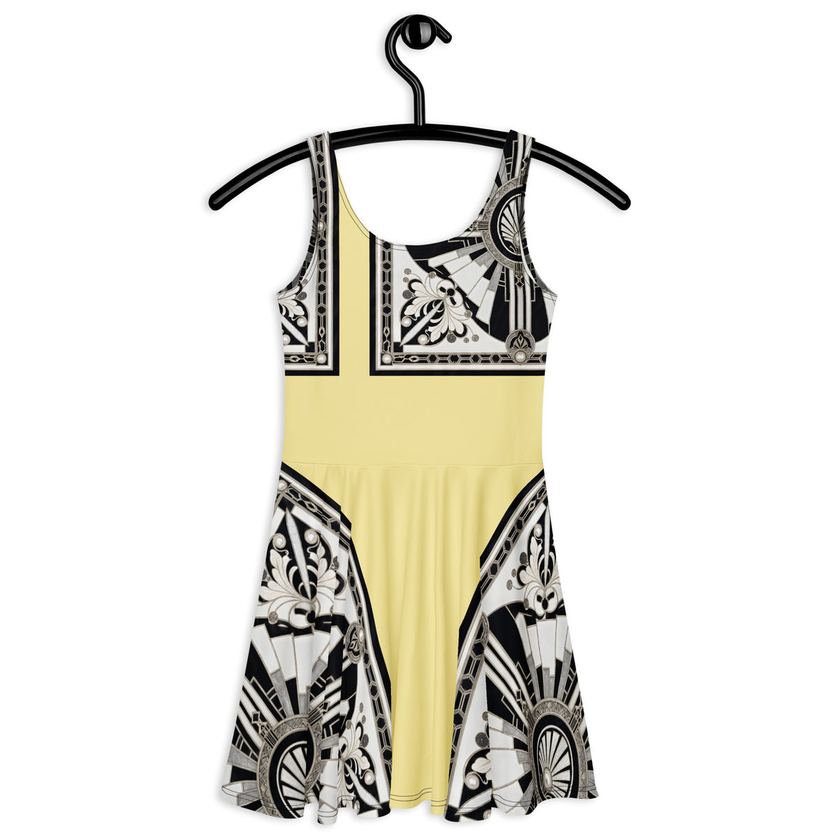 A sleeveless fit-and-flare dress with a pastel yellow center panel and black-and-white geometric patterned sections on the bodice and skirt, hanging on a black hanger against a plain white background.