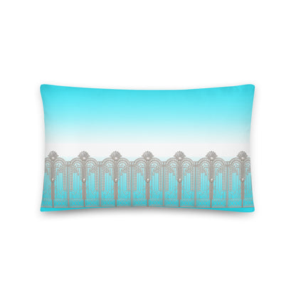 A rectangular lumbar pillow featuring a turquoise blue and white gradient background with a repeating silver-gray ornate arch pattern across the lower half, shown on a plain white background.