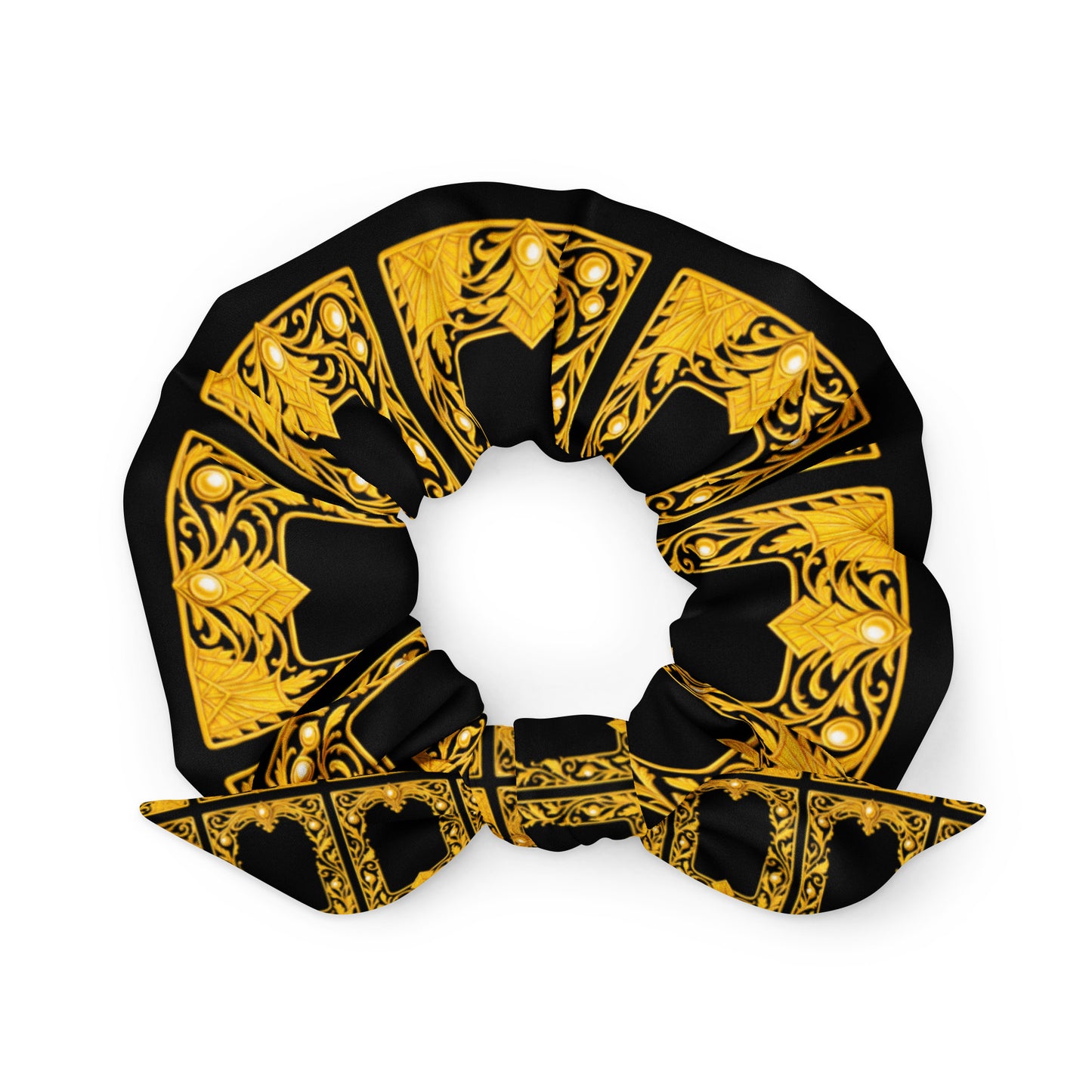 Black scrunchie with gold intricate Baroque frame patterns on a white background