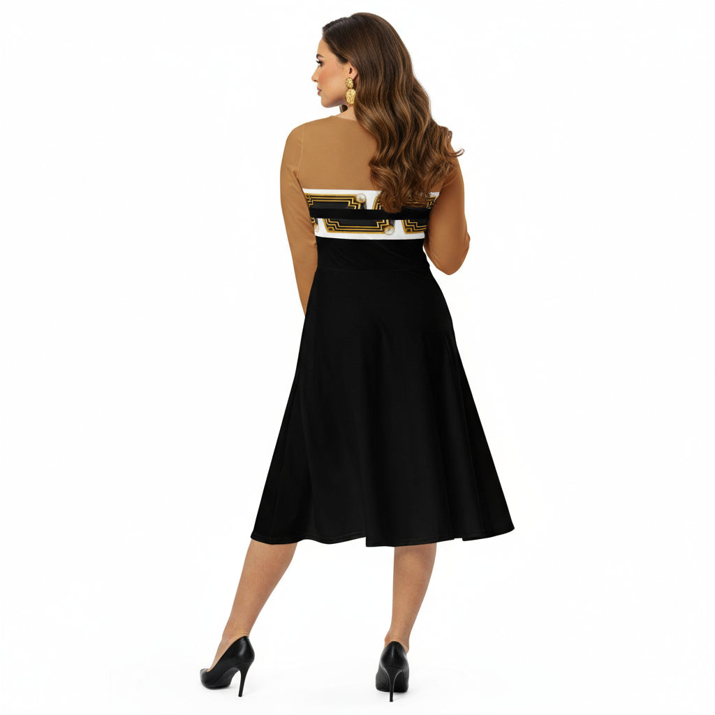 A back view of a model wearing ARTEMI ARTELIA original designs — an A-line long sleeve jersey midi dress in nude and black colour-block design featuring Egyptian Revival Art Deco Pharaoh motifs.